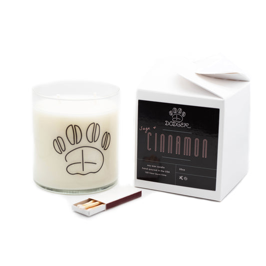Sage + Cinnamon Dodger logo black and white candle