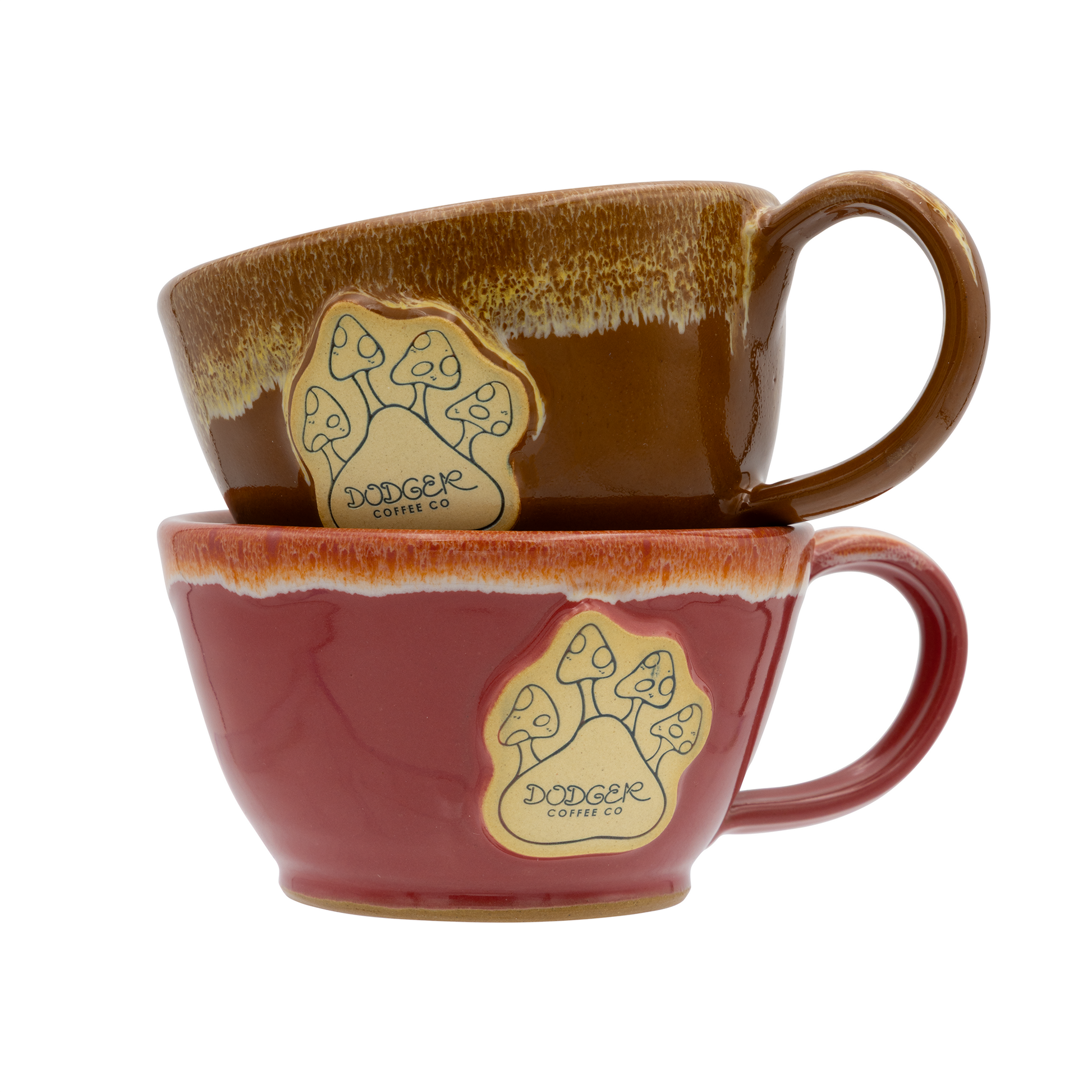 Two ceramic mugs, one brown and one red, with a logo on a white background