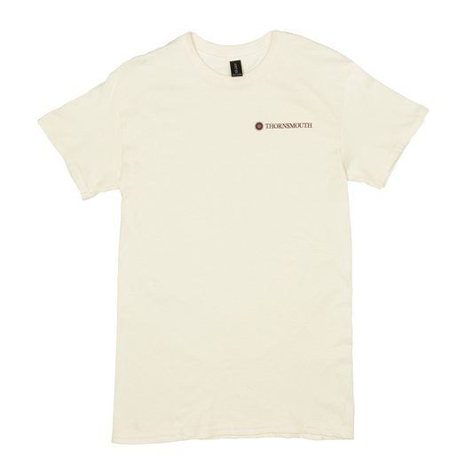 cream tshirt that reads Thornsmouth