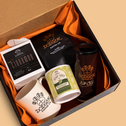Dodger Bundle Products, including cinnamon candle, hot cocoa, green tea, mug, coffee